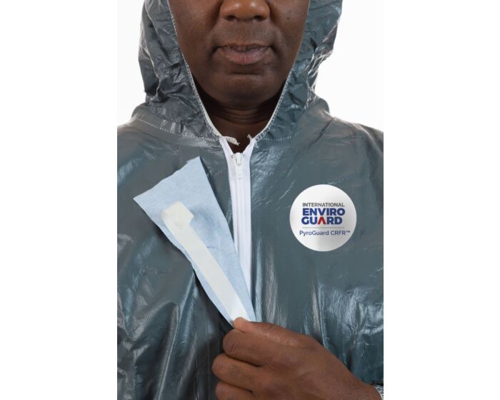 Person wearing a gray raincoat with a visible brand logo on a white background
