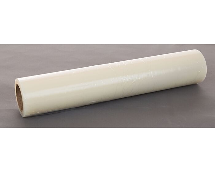 Roll of white paper on a gray surface