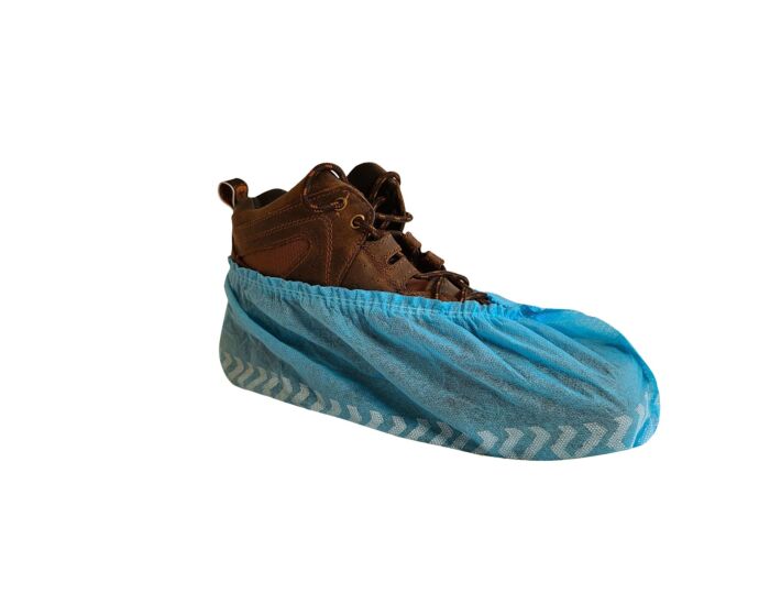 Brown boots with blue shoe covers on a white background