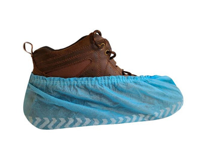 Brown shoe with a blue shoe cover on a white background